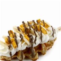 Banana Nutella Crunch · Fresh cream with banana slices, Cap'n Crunch cereal, and a drizzle of Nutella on top of a cr...