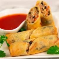 Shrimp & Chicken Egg Rolls · Three per order. Served with sweet and sour sauce.