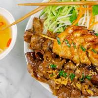 Grilled Pork & Grilled Shrimp With Vermicelli · Served with fish sauce, lettuce, cucumber, pickled carrot and daikon, scallion oil, crispy s...