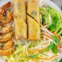 Grilled Shrimp & Egg Roll With Vermicelli · Served with fish sauce, lettuce, cucumber, pickled carrot and daikon, scallion oil, crispy s...