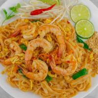 Shrimp Pad Thai · Flat rice noodles stir-fried in sweet and tangy Pad Thai sauce, egg and shrimps. Served with...