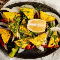 Saffron Paneer Tikka · Homemade cottage cheese marinated in saffron, yogurt and special spices, grilled in the tand...