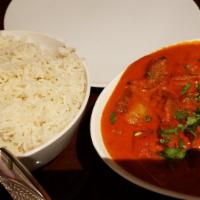Lamb Tikka Masala · Lamb cubes cooked in mildly spiced tomato onion gravy with green peppers, onions, & fresh ci...