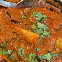 Viceroy Goat Curry · Goat cooked in an onion, tomato, and yogurt-based sauce, flavored with ginger, garlic, chill...