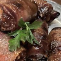 Bacon-Wrapped Dates With Parmesan · *Consuming raw or undercooked meats, poultry, seafood, shellfish, or egg may increase your r...