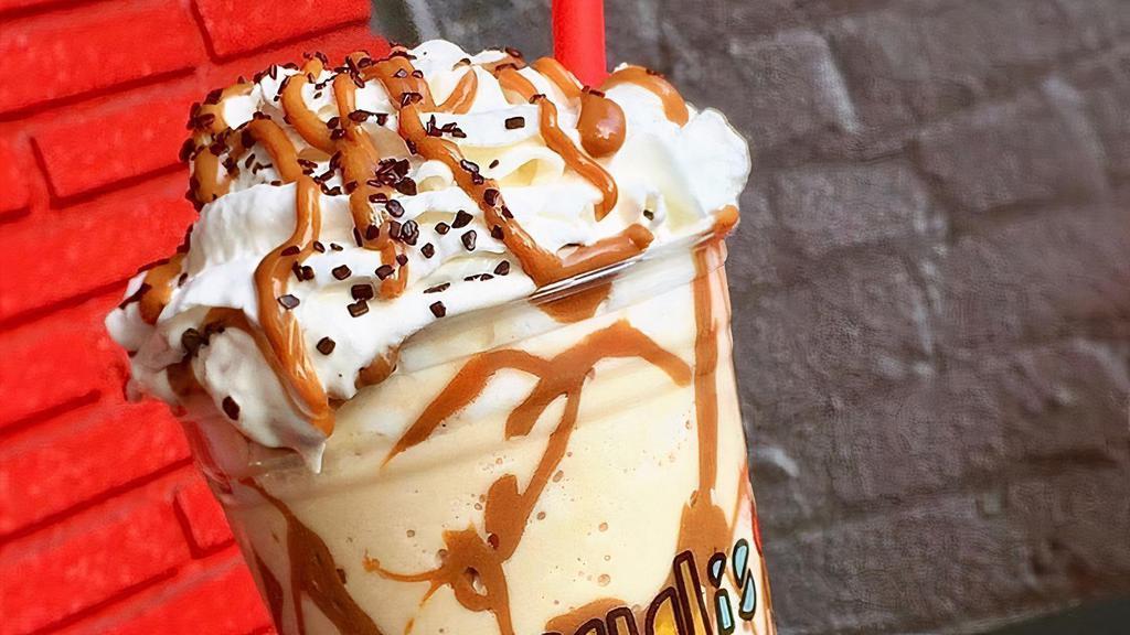 Sea Salt Caramel Cold Brew Frappe · Three scoops of sea salt caramel ice cream, mixed with cold brew coffee and a splash of milk. Topped with whipped cream and chocolate sprinkles.
