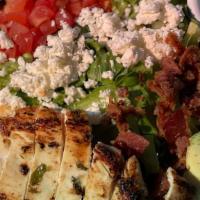 Cobb Salad · Romaine grilled breast of chicken, bacon, feta, hard boiled egg, avocado, roma tomato, ranch...