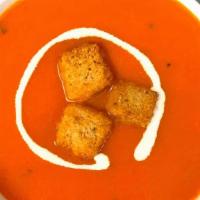 Tomato Soup · A tangy soup of spice-tinged tomatoes.