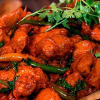 Apollo Chicken · Boneless chicken marinated in Indian spices and cooked with Apollo suace.