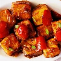 Paneer Manchurian · Batter fried Indian cottage cheese tossed in Manchurian sauce.