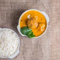 Malai Kofta · Golden balls made of nuts and cheese cooked in creamy sauce.