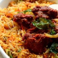 Vijayawada Chicken Biryani - Family Pack · Aromatic Basmati rice made with Indian herbs served over boneless chicken pieces mixed with ...