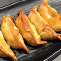 Deep Fried Tonsho Gyoza · Deep-fried pork dumplings with minced leek and garlic.