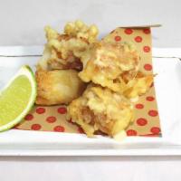 Fried Cheese Fish Cake · Deep-fried fish cake stuffed with cheese and with extra salt on the side.