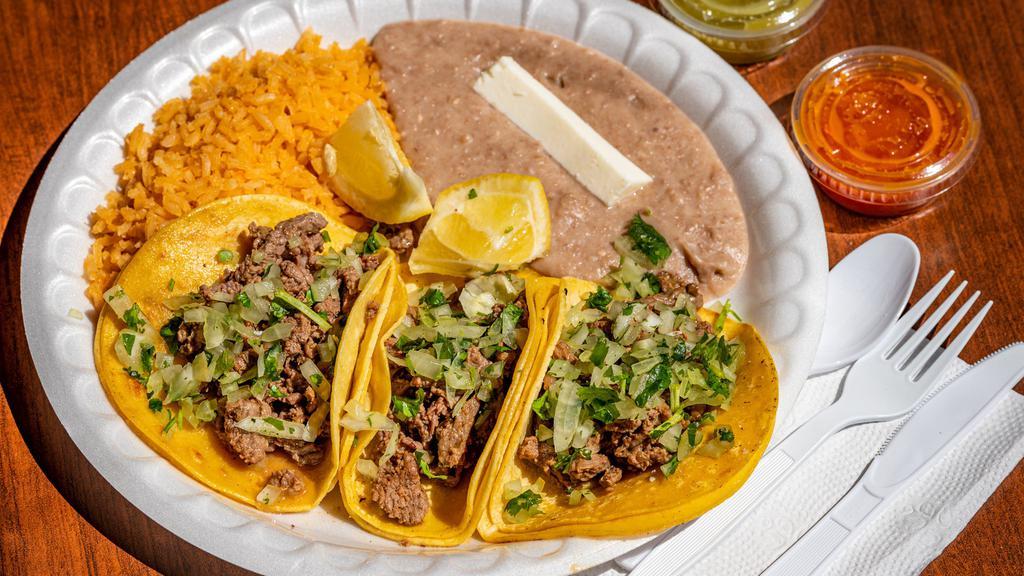 Three Asada Tacos With Rice & Beans · 