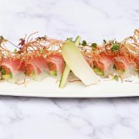 Aka Roll · Cut roll. Spicy tuna, avocado, arugula with seared tuna and tamanegi soy.