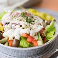 Greek Salad · Chopped romaine lettuce, onion, tomato, and added kalamata olives topped with garlic sauce a...