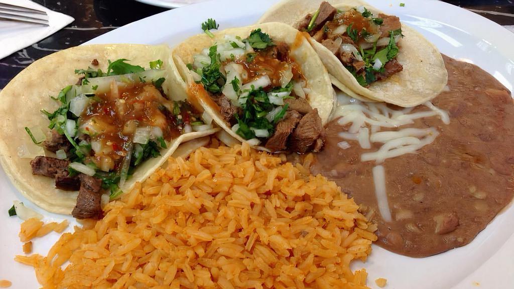 3 Tacos Combo · 3 tacos (street taco size) Served with rice and beans
topped with cabbage, cilantro & onions