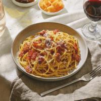 Pasta Carbonara · Spaghetti with pancetta tossed in a carbonara sauce with parmesan cheese.