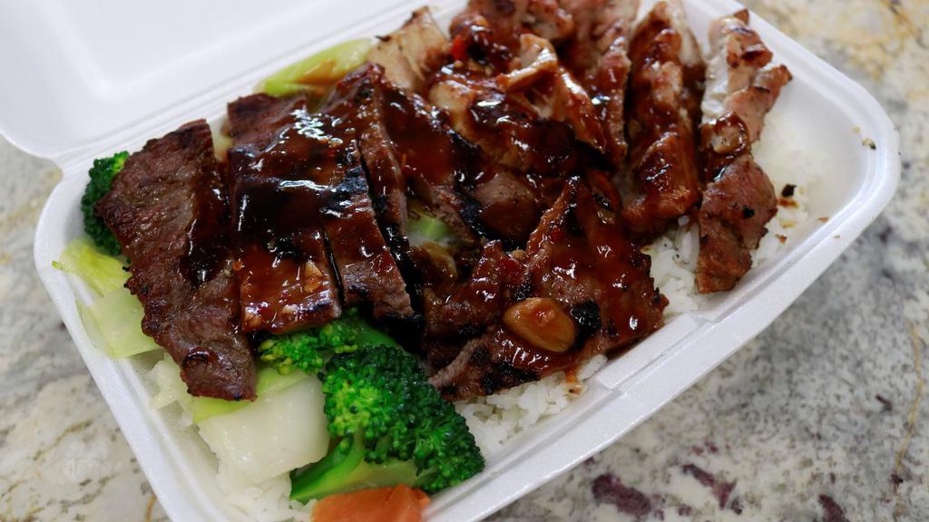 Chicken & Beef Combo · Chicken and beef topped with your choice of teriyaki sauce or hot garlic sauce along with your choice of rice, noodles, or vegetable only. Mixed vegetables are included with choice of rice or noodles.