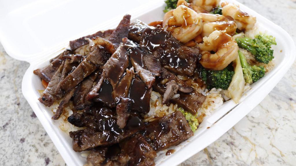 Beef & Shrimp Combo · Beef & shrimp topped with your choice of teriyaki sauce or hot garlic sauce along with your choice of rice, noodles, or vegetable only. Mixed vegetables are included with choice of rice or noodles.