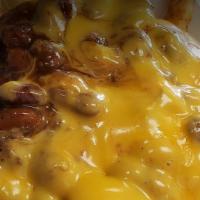 Chili Cheese Fries · Crispy fries topped with chili and cheddar cheese.