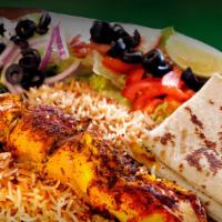 Chicken Kabob · Boneless chicken breast marinated 48 hours prior with special homemade spices served with ri...