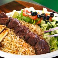 Tikka Kabob (Lamb) · Chunks of tender beef marinated 48 hours prior with home-  made spices served with rice and ...