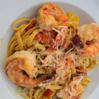 Cajun Pasta · Sauteed shrimp, shallots, garlic, chicken andouille sausage, tri-color peppers, parmesan, to...
