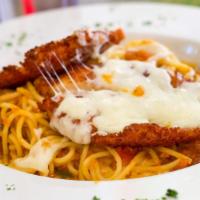 Chicken Parmigiana · Spaghetti with breaded chicken breast topped with melted mozzarella cheese in marinara sauce.