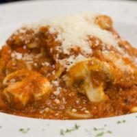 Spaghetti Bolognese · Meat sauce with mushrooms topped off with parmesan cheese.