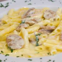 Penne With Italian Sausage · Diced sausage, basil, onion in cream sauce.