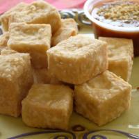 Fried Tofu (8 Pieces) · Deep fried tofu served with house sauce.
