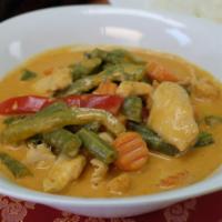 Panang Curry · choice of meat cooked in Panang curry sauce with baby corn bell pepper and basil.