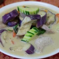 Green Curry · Choice of meat cooked in green curry sauce with eggplant bell pepper basil and carrots.