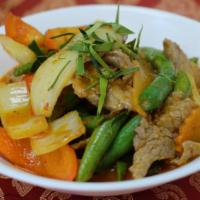 Pad Prik Khing · Choice of meat stir-fried sautéed with bell peppers,carrots,onions, and green beans in Thai ...