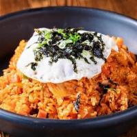 Kimchi Fried Rice · Spicy. Kimchi & Spam fried rice and topped w/Fried egg.