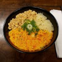Spicy Mentaiko-Soboro Donburi · Steamed white rice topped with soboro (seasoned sauteed minced chicken), torched mentaiko ma...