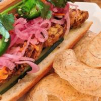 Vegetarian Banh Mi · Vegan Option. Vietnamese sandwich stuffed w/lemongrass chili stir fry tofu topped w/pickled...