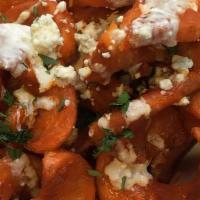 Buffalo Fries · Spicy. Sidewinder fries tossed in buffalo sauce and blue cheese.