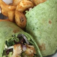 Buffalo Chicken Wrap · Spicy. Crispy chicken tossed in buffalo sauce with romaine lettuce, red onions, avocado, cru...