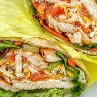 Grilled Chicken Wrap · Includes mixed greens, diced tomatoes, shredded cheese, choice of dressing.