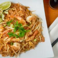 Pad Thai · Pan-fried thin rice noodle served with bean sprout, carrot, cabbage, crushed peanuts.
