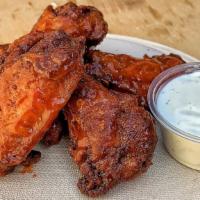Hot Wings · 6 Pieces Hot Wings served with side of house ranch.
