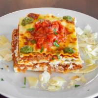 Lasagna Mama-Mia · Made with our classic tomato meat sauce and three Italian cheeses.