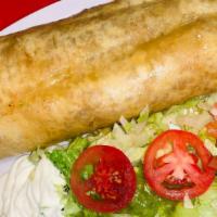 Chimichanga (Crispy Fried Flour Tortilla) · (Choice of meat)
Rice, beans, sour cream, guacamole, and cheese.