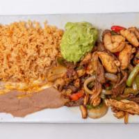 Fajitas Plate · Delicious marinated pieces of meat sautéed with bell peppers, onions, and tomatoes. Side of ...