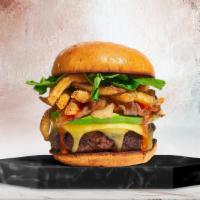 Everything Is Here Burger · American beef patty cooked medium rare and topped with your choice of fries, avocado, carame...