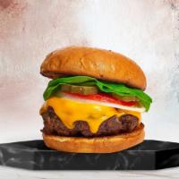 Seen Cheddar Days Burger · American beef patty cooked medium rare and topped with melted cheese, lettuce, tomato, onion...