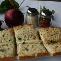 Garlic Cheese Bread · Nicolosi’s specialty House made bread, butter, garlic, romano, parsley and mozzarella.